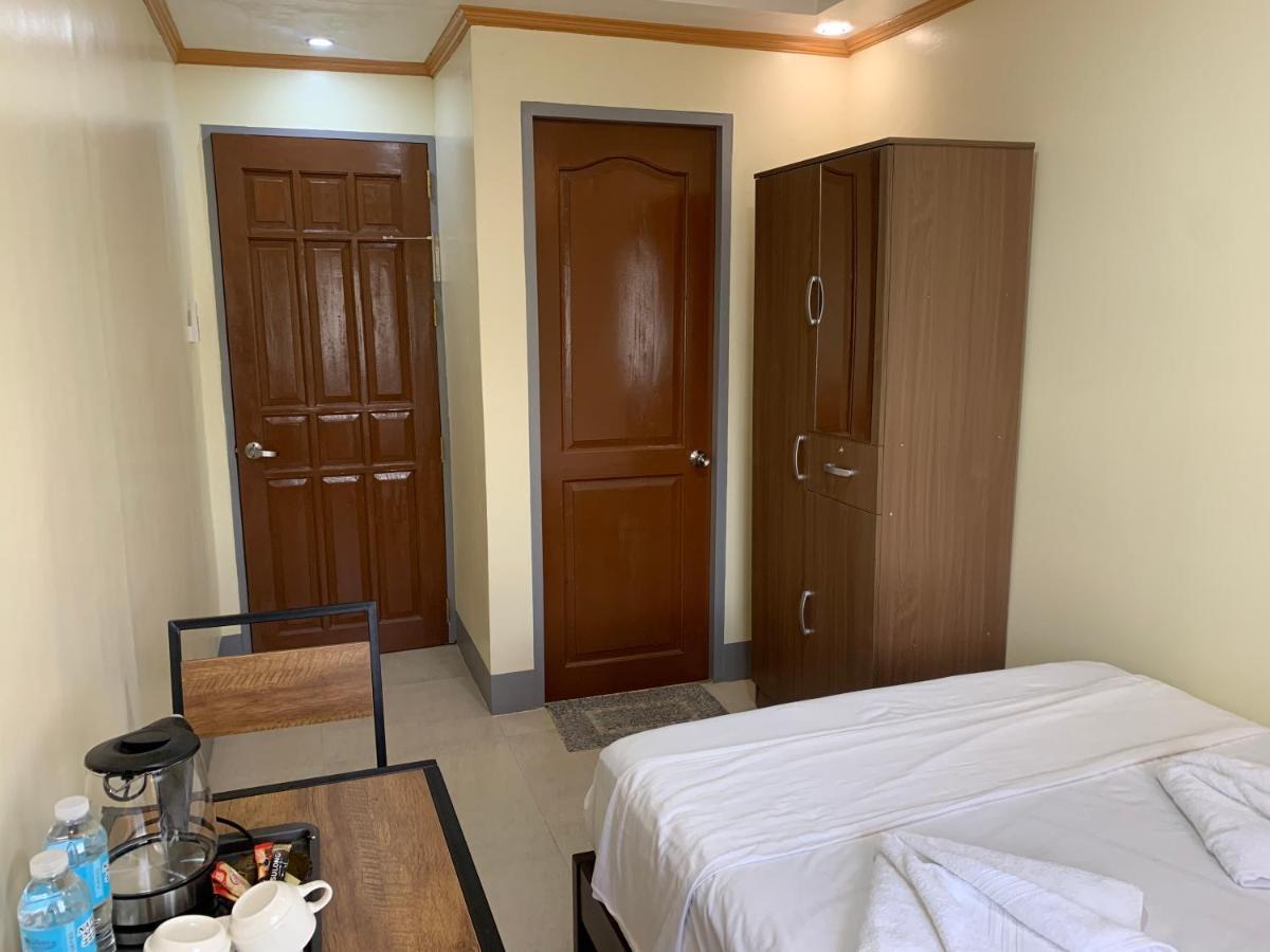 Zl Travelers Inn Batuan Exterior foto