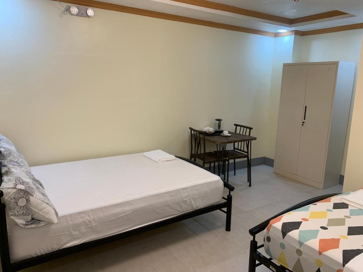 Zl Travelers Inn Batuan Exterior foto