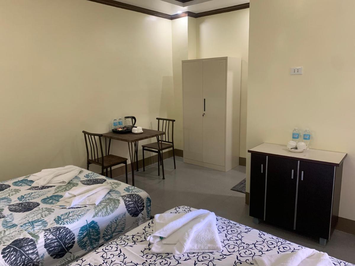 Zl Travelers Inn Batuan Exterior foto