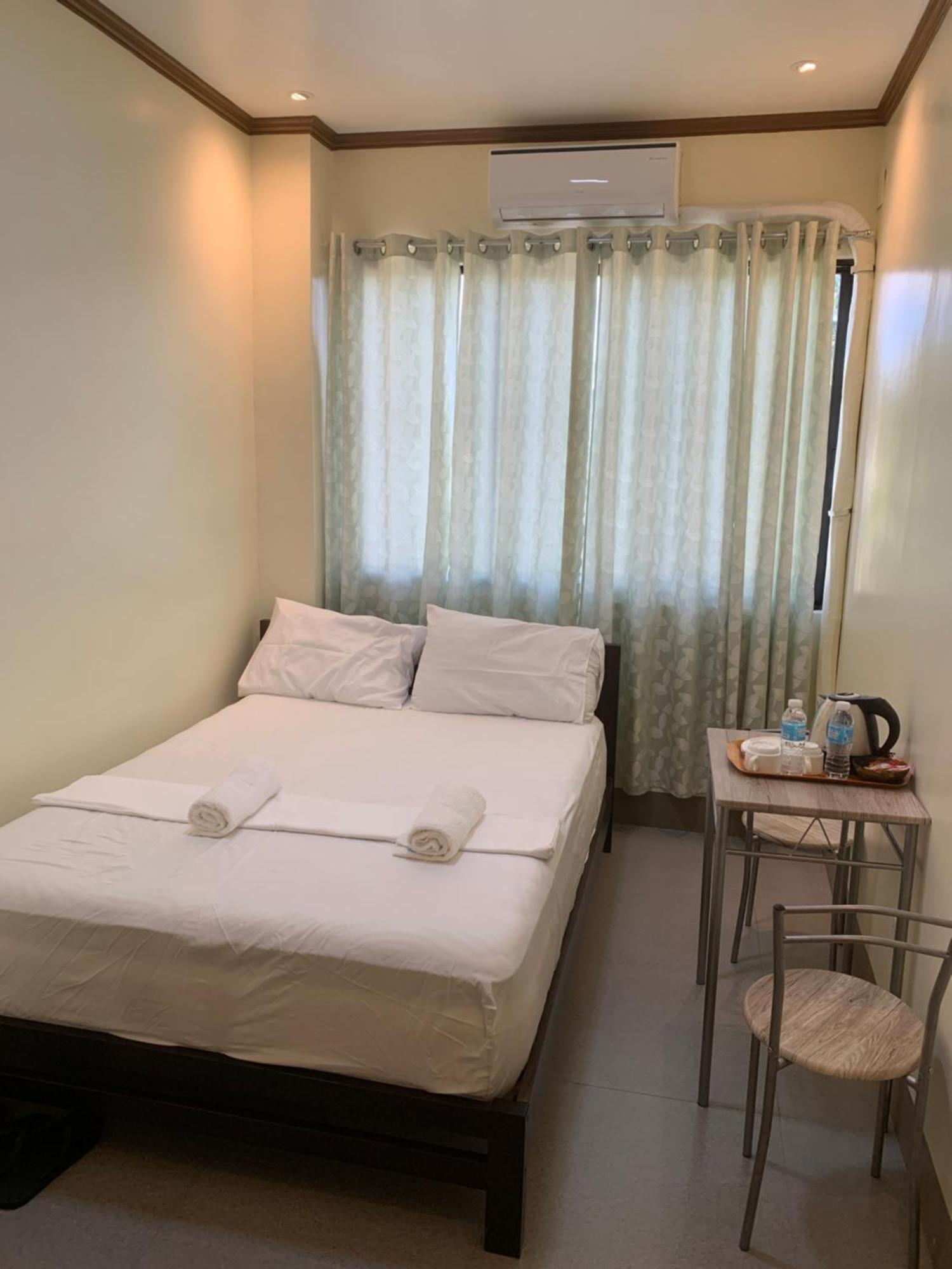 Zl Travelers Inn Batuan Exterior foto