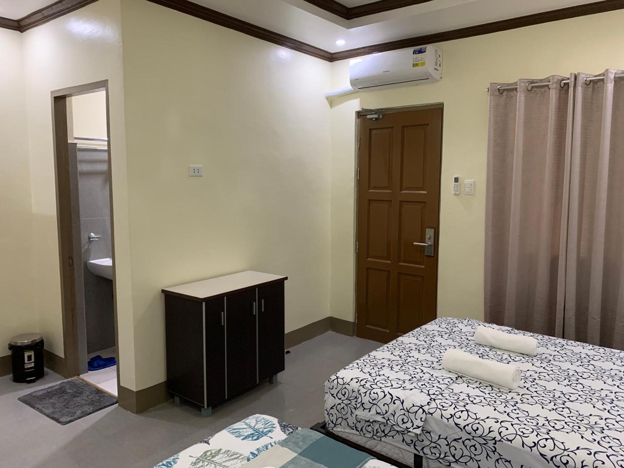 Zl Travelers Inn Batuan Exterior foto