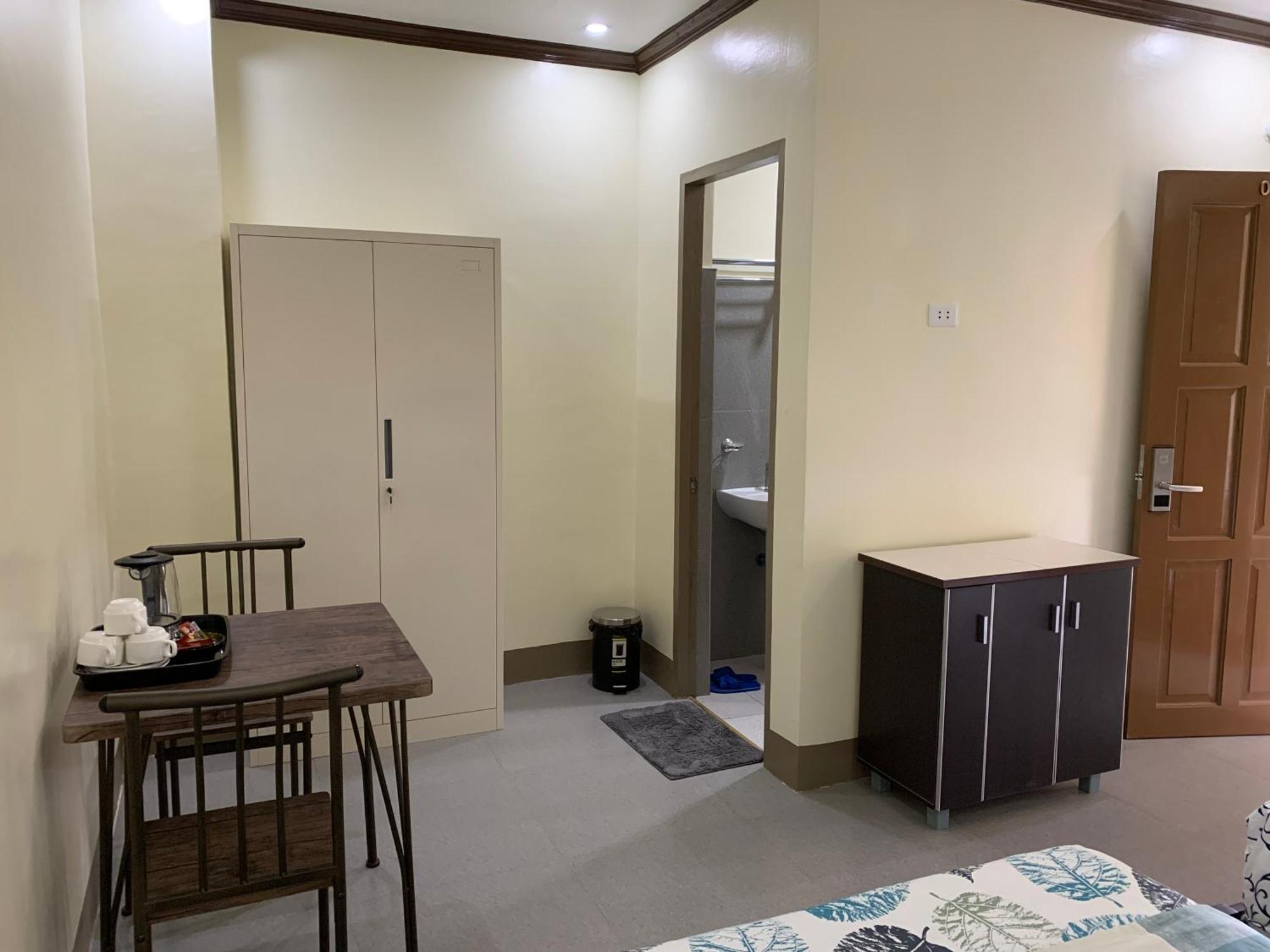 Zl Travelers Inn Batuan Exterior foto
