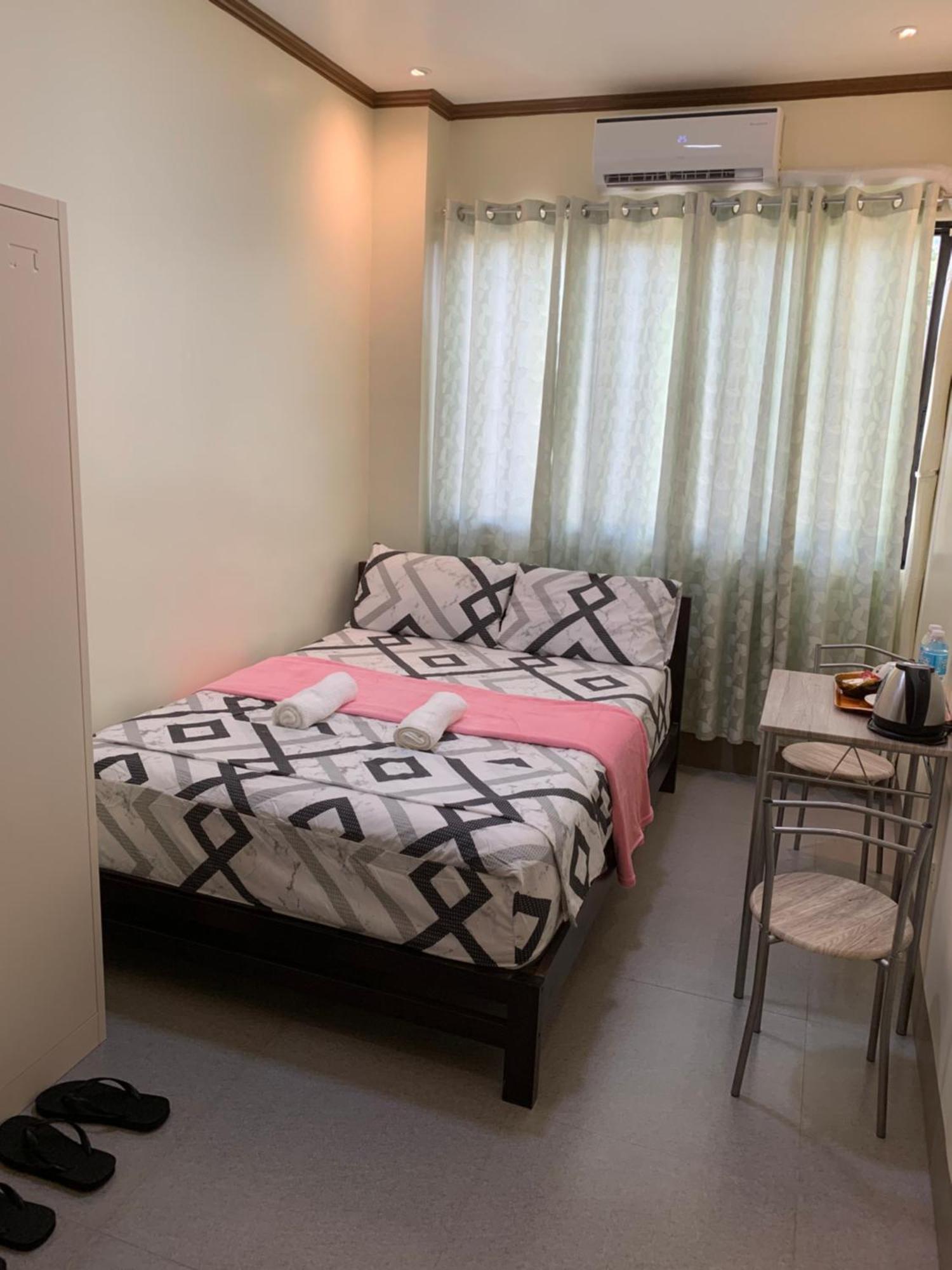 Zl Travelers Inn Batuan Exterior foto