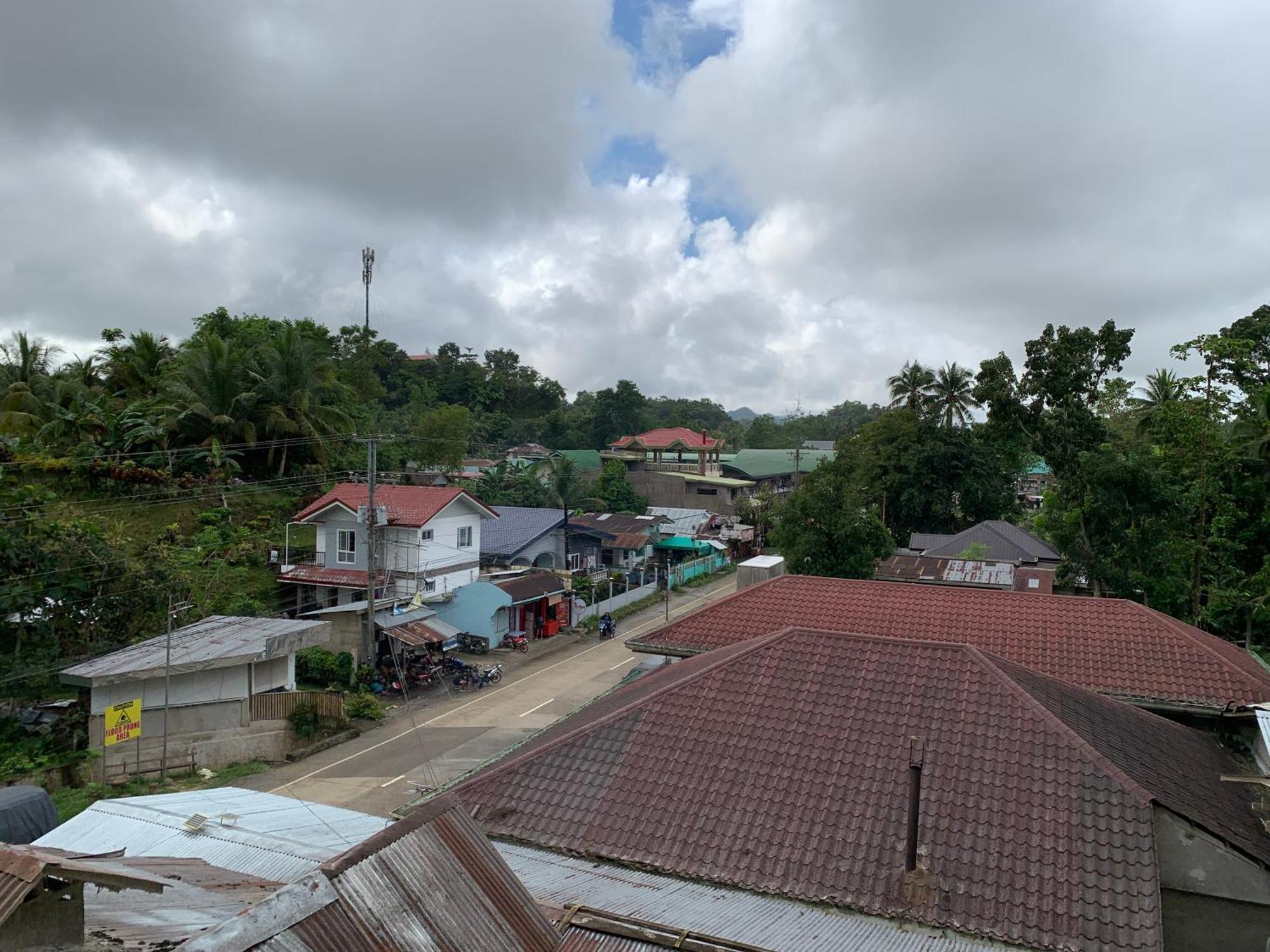 Zl Travelers Inn Batuan Exterior foto