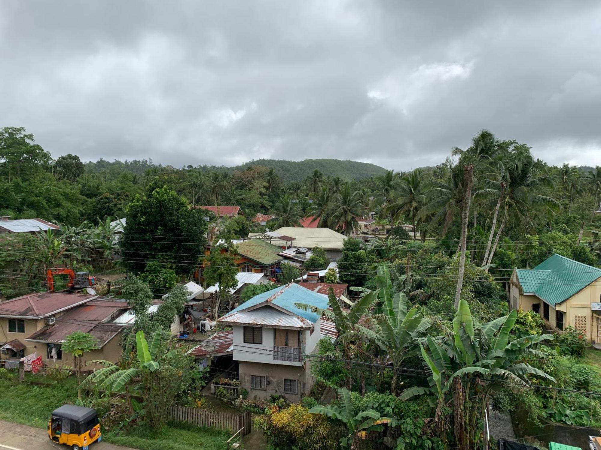 Zl Travelers Inn Batuan Exterior foto