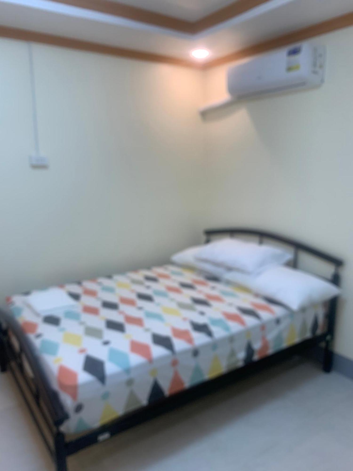 Zl Travelers Inn Batuan Exterior foto
